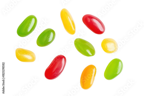A assortment of jelly beans in various colors including green. yellow. and red. scattered playfully on a clean white background. perfect for candy-themed promotions or events