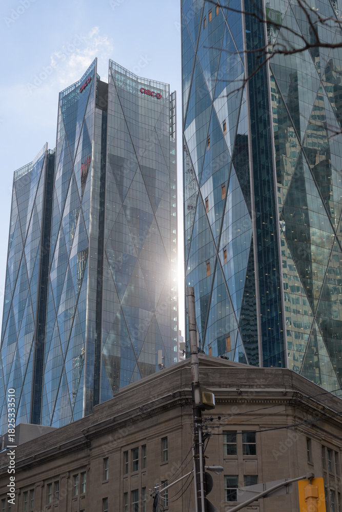 Naklejka premium contrast of Dominion Public Building (1 Front St) and CIBC Square, North and South Towers (141 Bay St), Toronto