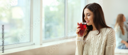 Woman with delicious mulled...