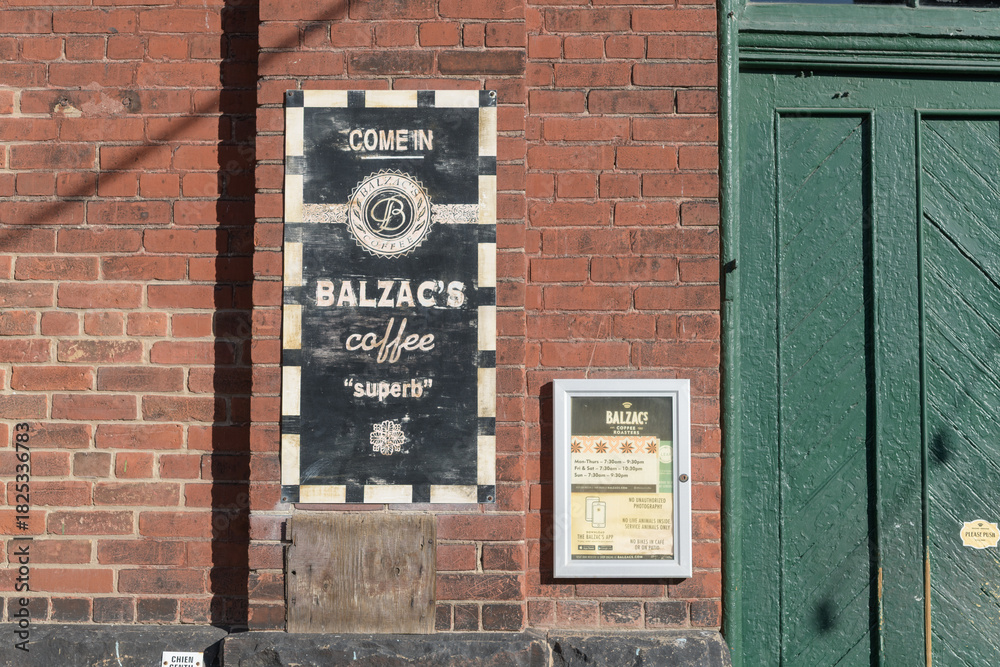 Fototapeta premium sign outside Balzac's Distillery District, a cafe, located at 1 Trinity St, Toronto