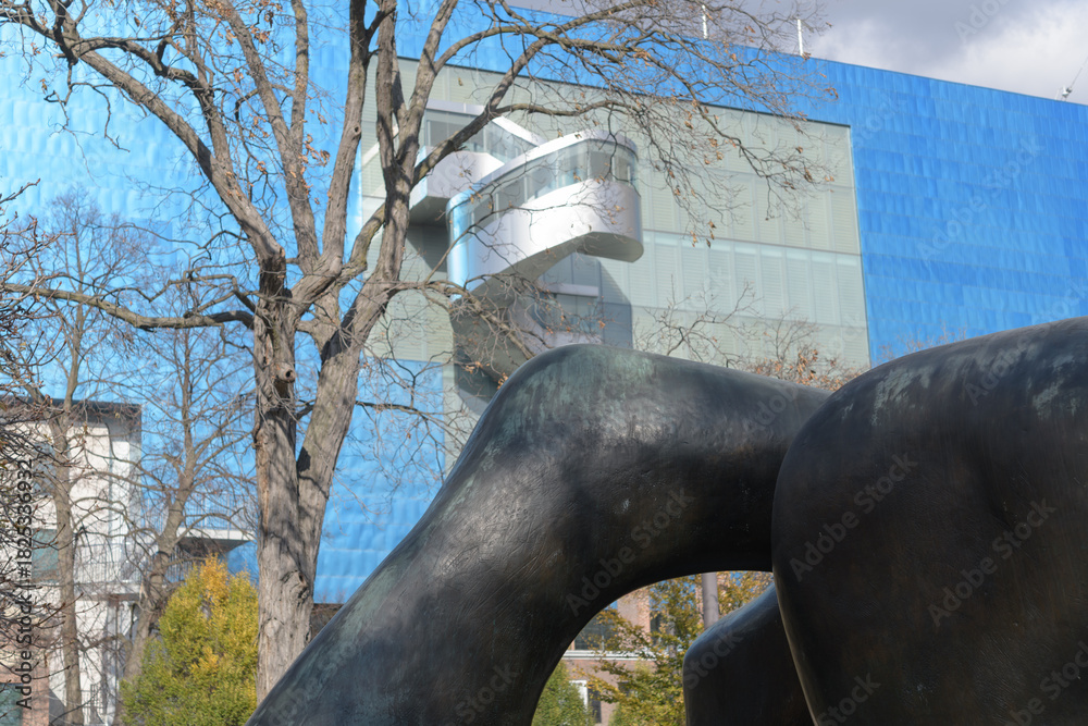 Fototapeta premium exterior of the Art Gallery of Ontario seen from Grange with part of Park Henry Moore's Large Two Forms, Toronto