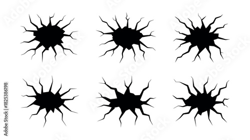 Set of Six Black Cracked Hole Silhouettes on White Background