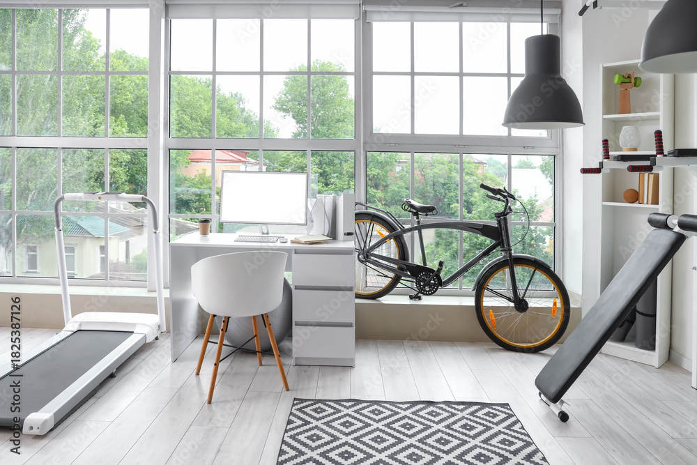 Naklejka premium Interior of gym with modern sports equipment