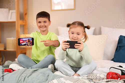Cute happy little kids with...