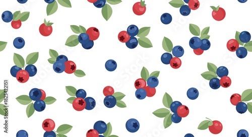 A delightful scattering of ripe blueberries and raspberries with green leaves on a white background.