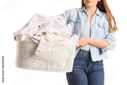 Young woman holding laundry...