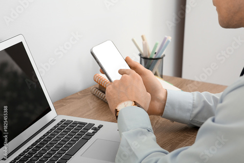 Businessman using modern mo...