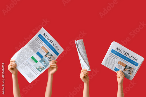 Female hands with newspaper...