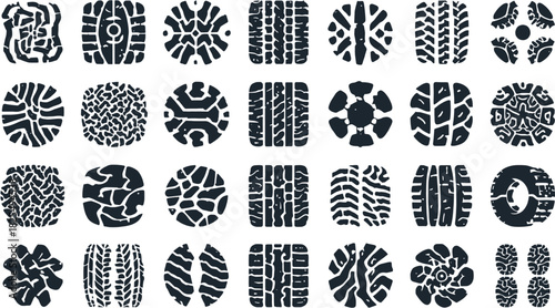 A collection of various tire tread patterns in black and white, ideal for design elements and backgrounds, showcasing diverse textures.