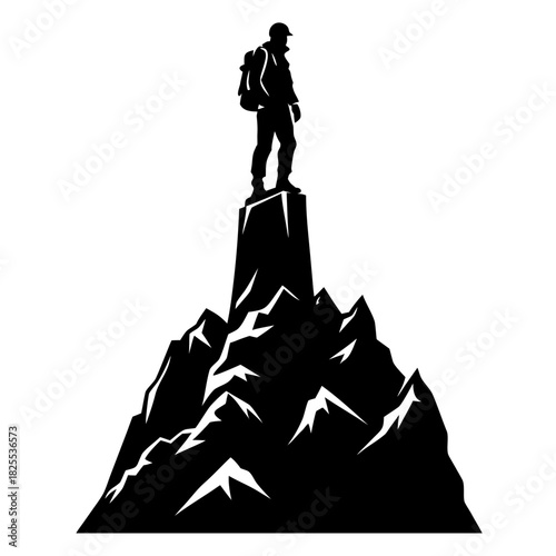 Silhouette of a hiker standing on a mountain peak