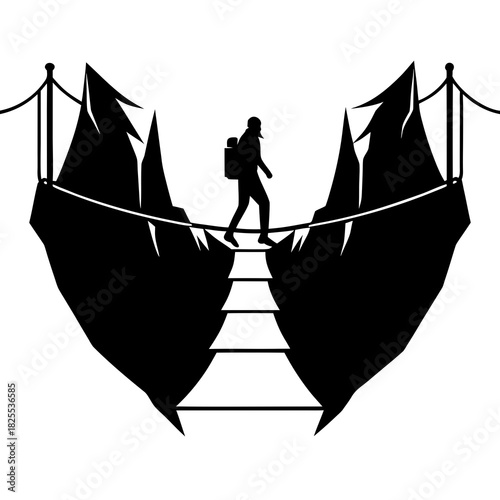Silhouette of a person crossing a rope bridge between two mountains