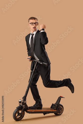 Rushing young businessman c...