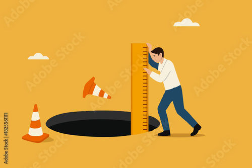 risk estimation, estimate business risk, businessman using a ruler measures the depth of a hole on the road