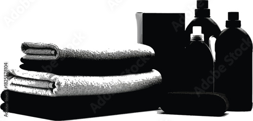 Stacked towels with cleaning bottles, sponge and box for hygiene