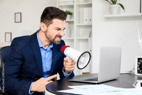 Angry businessman shouting ...