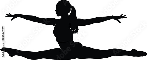 Silhouette of a gymnast performing a split
