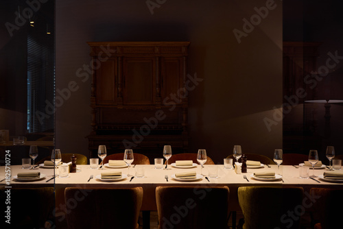formal boardroom dining scene featuring neatly folded napkins and subtle lighting ambiance