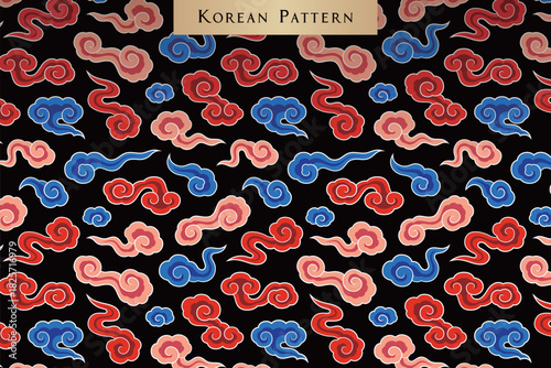 Traditional Korean Cloud Pattern with Vibrant Red and Blue Motifs on Black Background