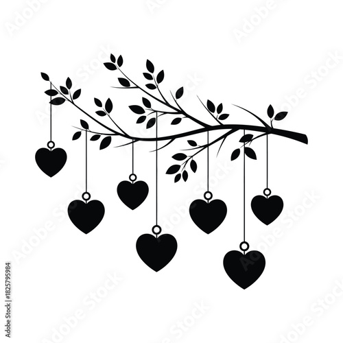 Hanging heart ornaments on branch silhouette