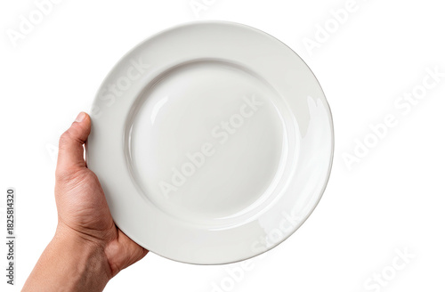 Wallpaper Mural White ceramic plate held by a hand on black background Torontodigital.ca