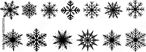 A seamless vector set of nature-inspired black silhouettes featuring grass, flowers, and ornamental leaves, perfect for winter and holiday decoration design