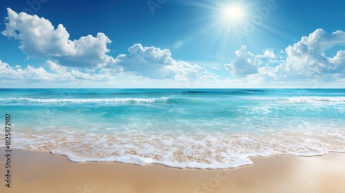 Clear blue skies with fluffy clouds reflect sunlight on a serene beach scene. Gentle waves wash ashore on soft sand creating a peaceful atmosphere.