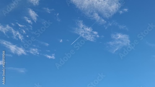 Clear Blue Sky With Jet Contrail Across Bright Day, Wide Open Air