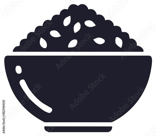 Dark silhouette of a bowl filled with rice and sesame seeds
