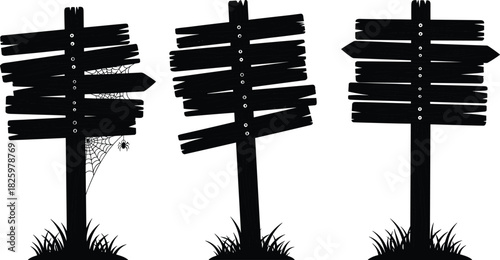 Silhouettes of old wooden signposts with worn planks, rustic direction boards featuring cobwebs, spider and grass for Halloween and vintage design