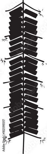 Tall vertical rack filled with many dark cylindrical objects on a white background