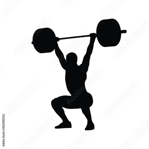 Strong weightlifter lifting heavy barbell overhead in squat