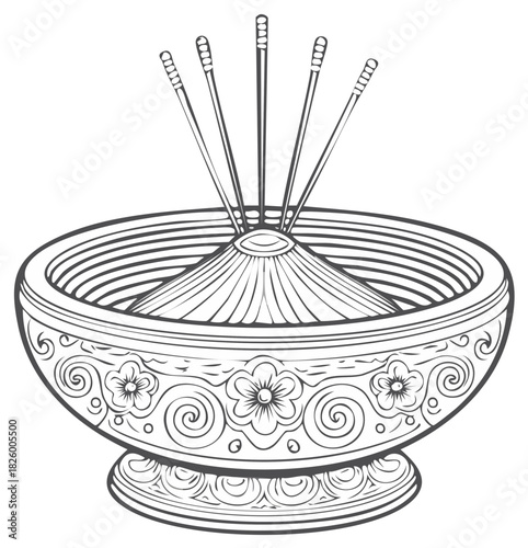 Detailed ornate incense burner with floral elements and incense sticks