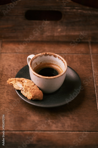 Cup of coffee on rustic wooden background. Soft focus. Copy space	