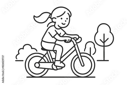 Happy young girl riding a bicycle outdoors in the park enjoying summer recreation and healthy activity