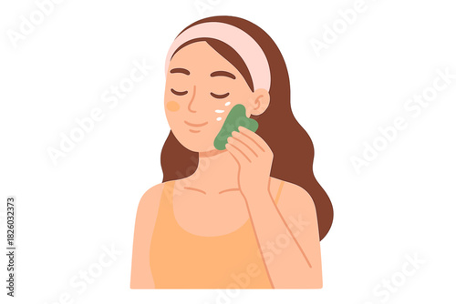 Woman applying cream and performing facial massage with a Gua Sha stone tool