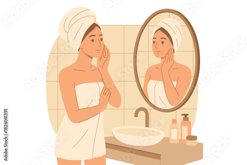 Young woman wrapped in towels applying face cream during self-care routine in bathroom mirror