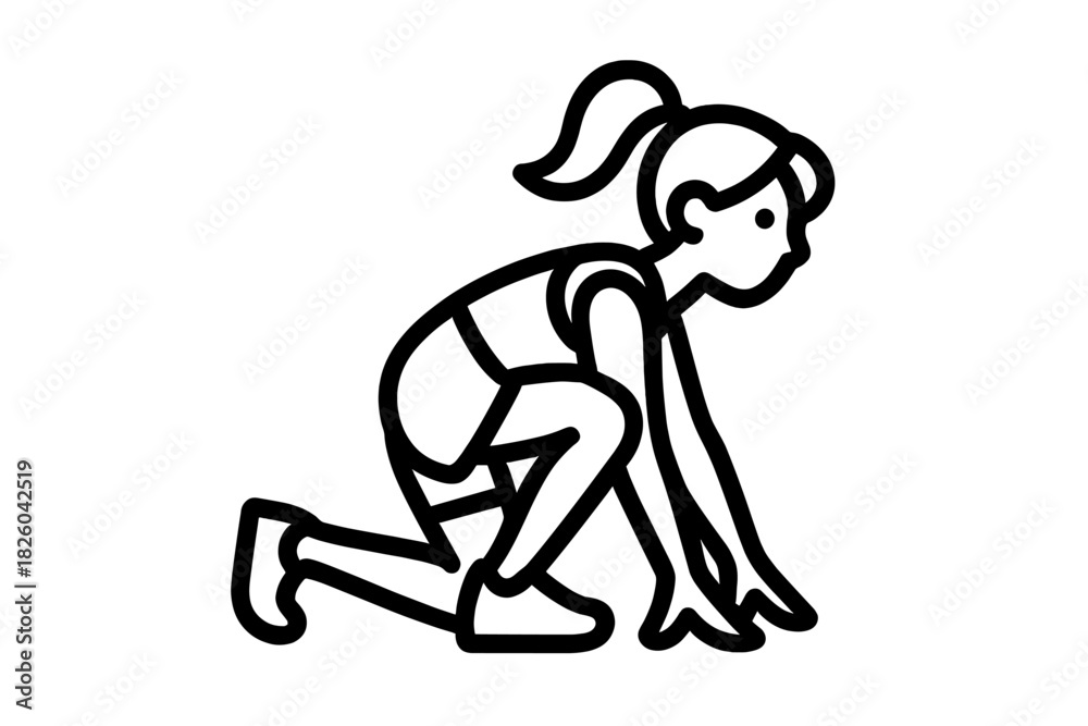 Fototapeta premium Female athlete in starting block position preparing to run a competitive sprint race on a track