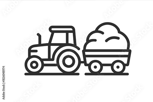 Agricultural tractor pulling a loaded farm wagon for farming and harvest operations