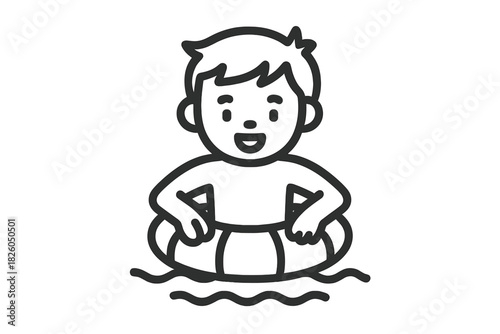 Cheerful young boy floating on an inflatable swim ring enjoying summer vacation water activity