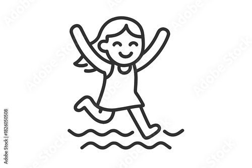 Cheerful young girl jumping and splashing in the water with excitement and joy