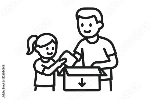 Father and daughter putting items into a cardboard box for moving or donation