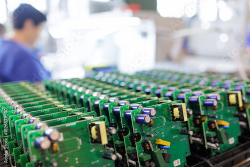 Obraz na plátně Rows of assembled electronic circuit boards at electronics manufacturing factory
