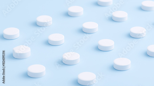 shallow. White tablets arranged in a geometric pattern on a light blue surface. STEM education sheets, lab safety posters, designed for biotech research communications, used by art directors.