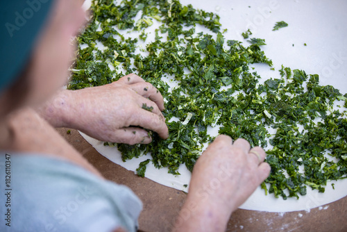 Traditional Gozleme Preparation with Herbs