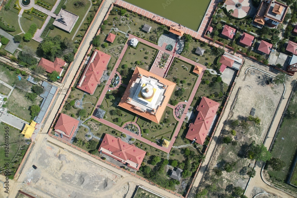Fototapeta premium Lumbini, the sacred birthplace of Lord Buddha in Nepal, is a serene pilgrimage site with monasteries, gardens, and ancient monuments reflecting peace, spirituality, and history.