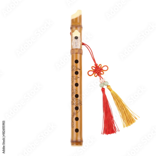 Traditional chinese bamboo flute with intricate knot and tassels isolated on black