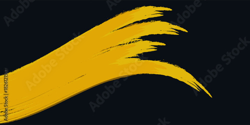 Yellow brush stroke isolated on black background