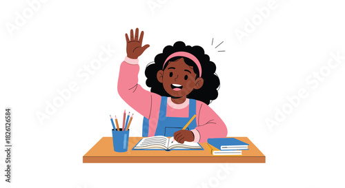 A young girl with dark curly hair wearing a pink sweater and blue overalls raises her hand while sitting at a wooden desk with pencils in a cup and books on the right side.