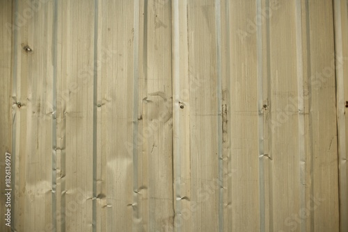 close up of a damaged metal sheet wall