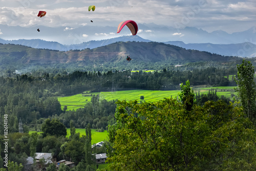 paragliders fly over the Kashmir valley India 2 May 2025